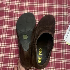 Brown leather clogs made by Me Too.